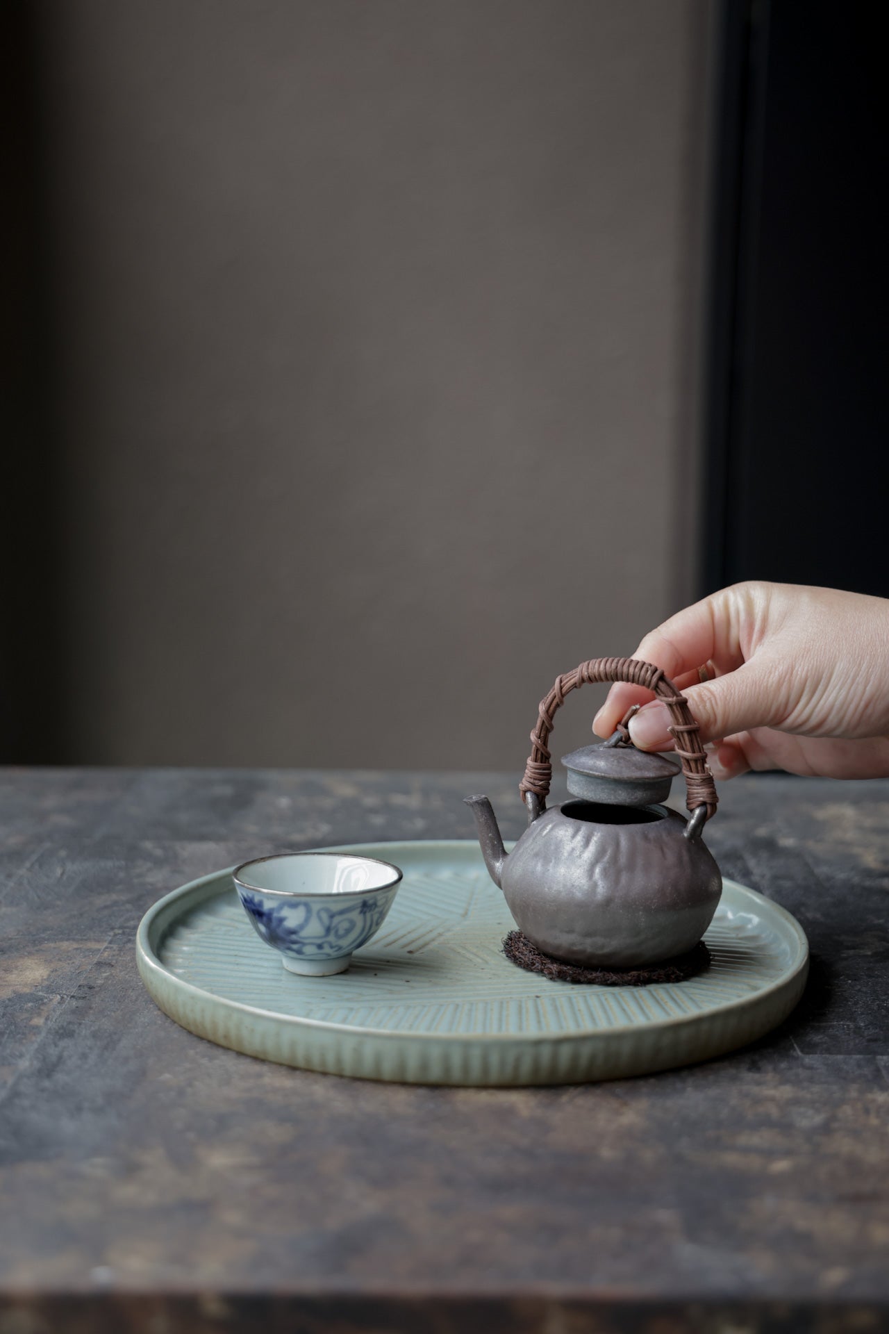 Best Ceramics-Rattan Handled Teapot Dehua Wood-Fired by Huang Qiuyang