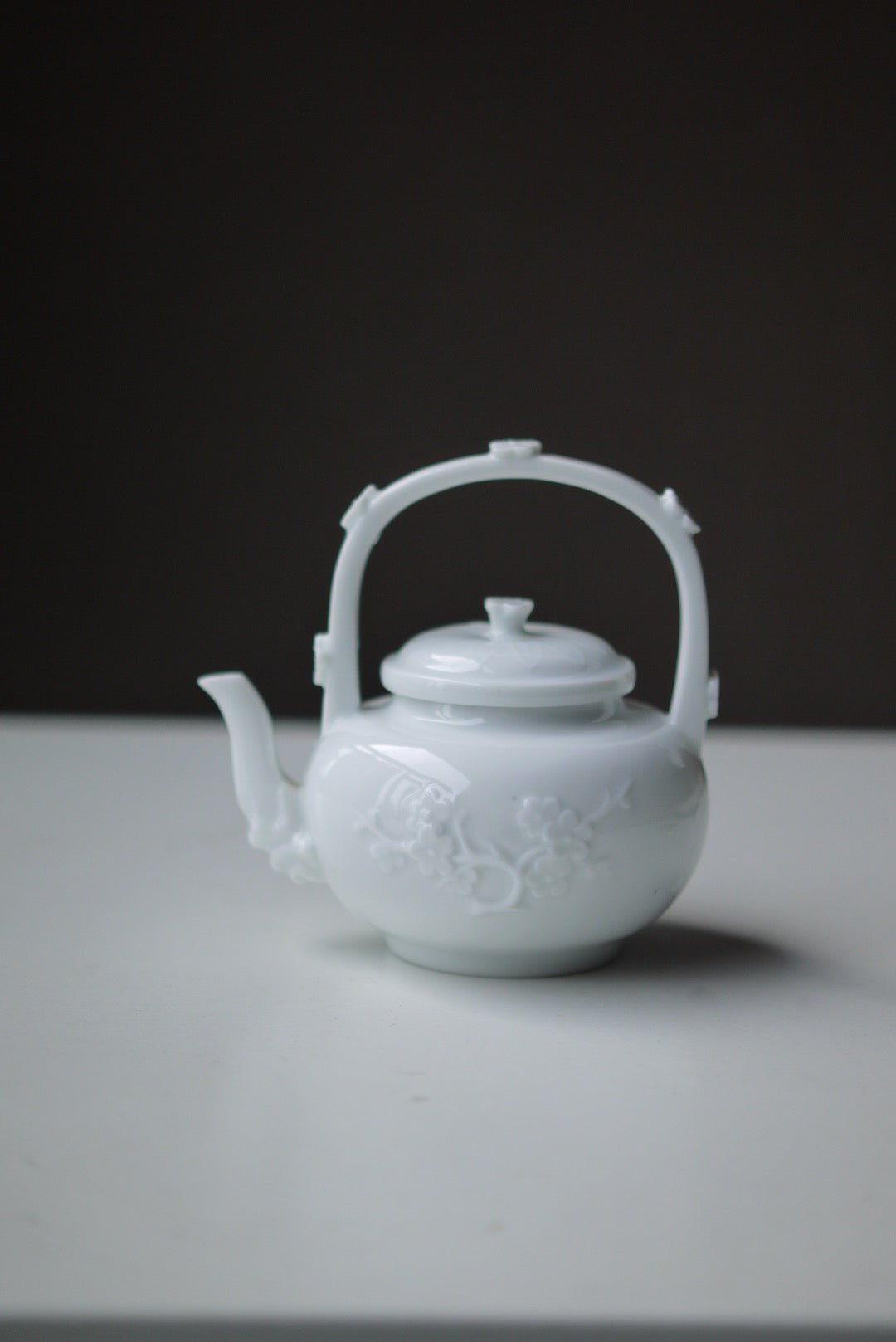 Vintage Dehua Blanc De Chine Plum Blossom Carrying Handle  Porcelain Teapot|BestCeramics
