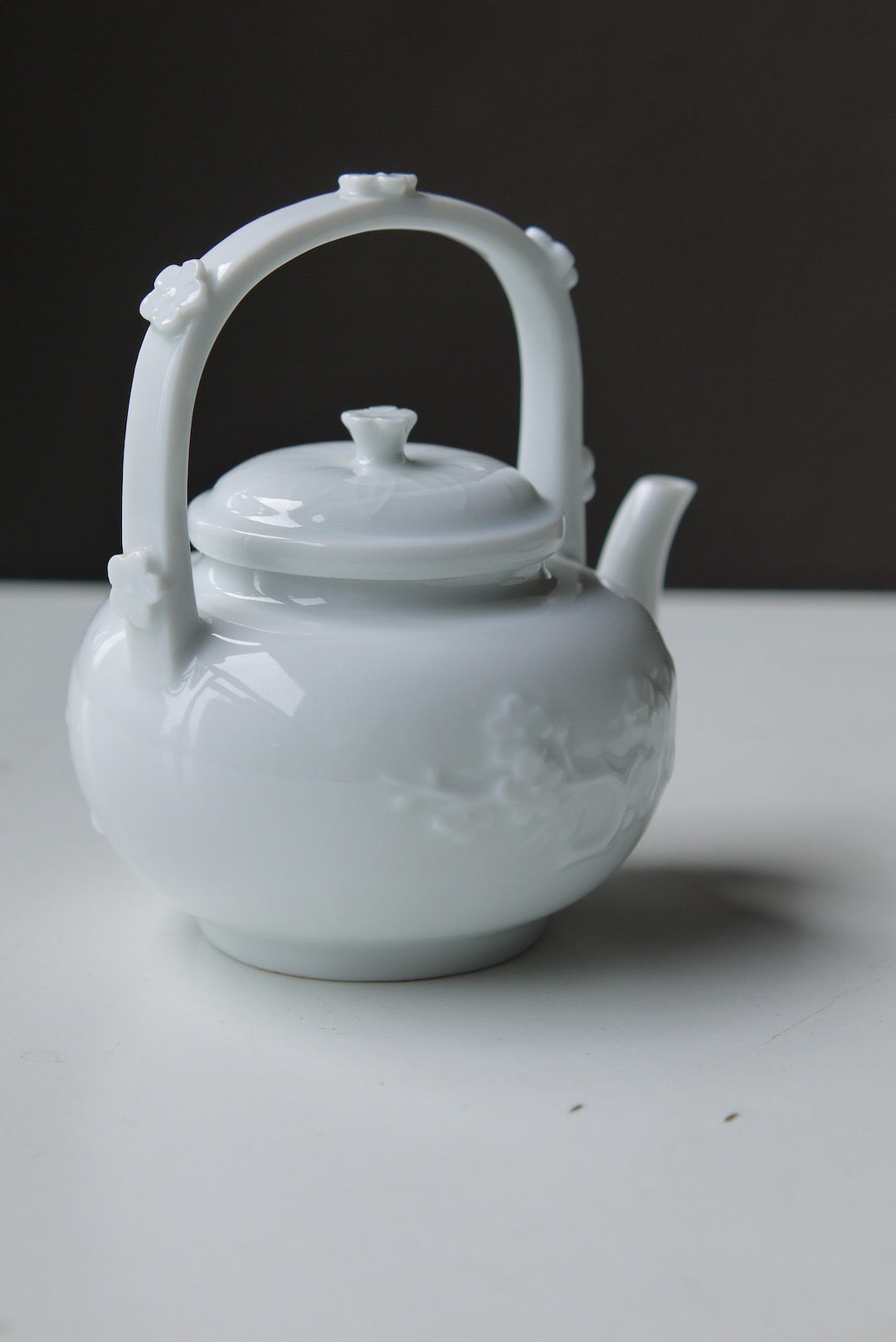 Vintage Dehua Blanc De Chine Plum Blossom Carrying Handle  Porcelain Teapot|BestCeramics